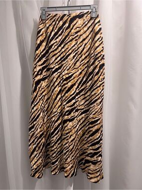 Woman’s Plus-size Animal Print Midi Skirt in Tan and Black